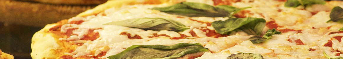 Eating Pizza at Mineo's Pizza House restaurant in Pittsburgh, PA.